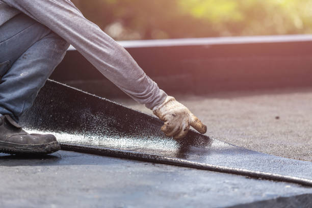 Professional Basement Waterproofing technician working in Brighton, TN